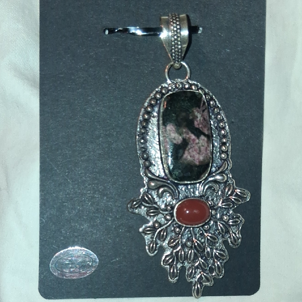 Elegant Silver and Red Pendant